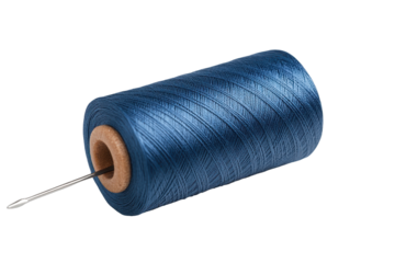 Blue thread spool with needle placed on a clean white background showcasing sewing supplies and tools in a simple presentation for crafting enthusiasts