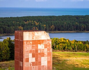 Striking Architecture Against a Verdant Backdrop Featuring a Tower Building