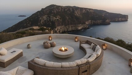 Luxury terrace on a rocky coast with sea view at sunset