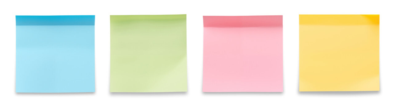 Set of four blank colorful sticky notes in blue, green, pink and yellow colors isolated on transparent background