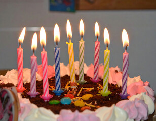 Birthday cake with lit candles