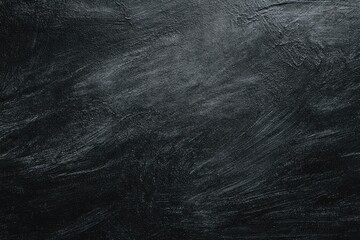 Dark textured surface with streaked, brushed effect