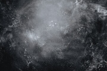 Dark gray textured surface with light gray splatter