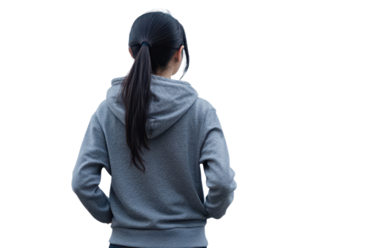 Asian woman casually dressed in sports attire walking outdoors on a clear day, enjoying exercise and fresh air while taking a break from daily routines