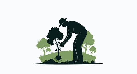 Silhouette of a person planting a tree in a green landscape
