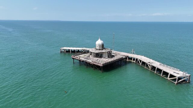 Herne bay derilict pier head in English Channel drone,aerial calm day blue sky