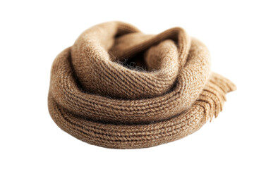 Cozy brown knitted scarf rests elegantly on a soft surface, inviting warmth during chilly seasons