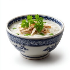 Traditional Asian rice porridge served in decorative ceramic bowl with shredded chicken and fresh cilantro garnish, comforting breakfast or meal option