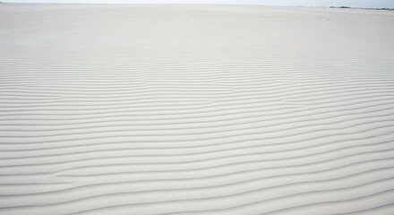 Obraz premium Serene White Sand Dunes with Subtle Wavy Patterns and Horizon