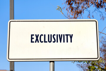 Equity, diversity, EXCLUSIVITY concept. Copy space. EXCLUSIVITY word written on a lonely road sign.