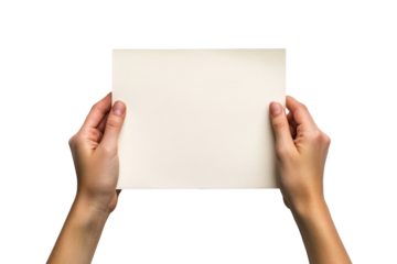 Hands holding blank paper in a well-lit setting, showcasing neutral colors and minimalism for creative use or expression during an artistic moment