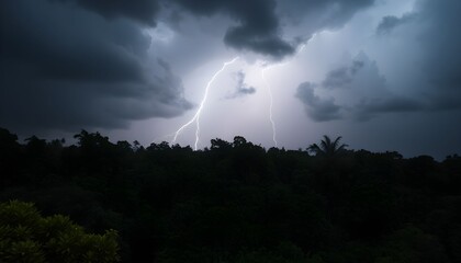 Lightning strikes illuminate a dark, stormy sky over a silhouetted treeline, creating a dramatic and powerful scene.