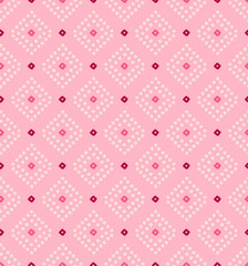 Nostalgic echoes of Bandhani textiles A cultural dance on pink fabric an ode to tradition and