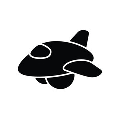 Stylized silhouette of a black orca whale shaped airplane flying against a white background