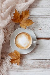 Coffee in a beautiful cup, autumn background, hot drink, aesthetic, instagrammable, beautiful autumn photo. For social media posts