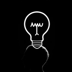 Head Silhouette with Glowing Light Bulb Idea, inspiration , solution