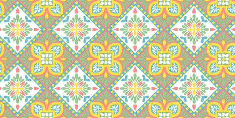 An intricate mosaic tile pattern brings a cheerful spring vibe with its floral motifs and soft
