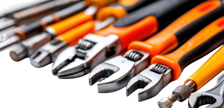 Close-up of Silver and Orange Adjustable Wrenches and Pliers on Black Background