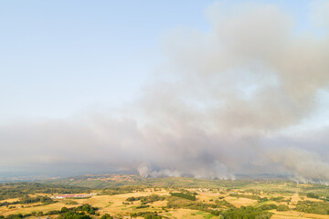An Aerial View of a Wildfire and a Large Smoke Plume. Concept The scale of a natural disaster.
