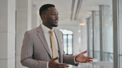 Professional man in suit giving presentation