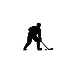 Hockey player with stick and puck vector