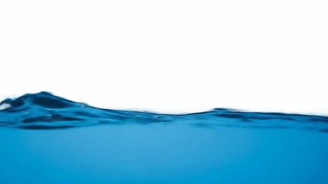 Blue water surface with bubbles against a stark white background