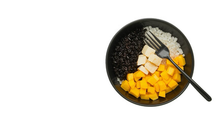 Minimalist Eye Level Rice Bowl with Black Beans Mango and Cheese Cubes
