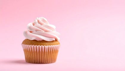Single Pink-Frosted Cupcake on Pink Background, Close-Up.