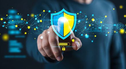 Man's hand touching a glowing shield icon on a digital interface, symbolizing cybersecurity, data protection, and online privacy