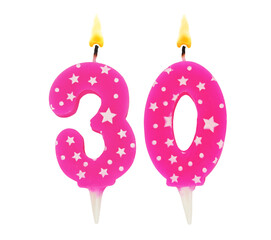 Burning pink with white stars birthday cake candles isolated on white background. Number 30.	