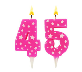 Burning pink with white stars birthday cake candles isolated on white background. Number 45.