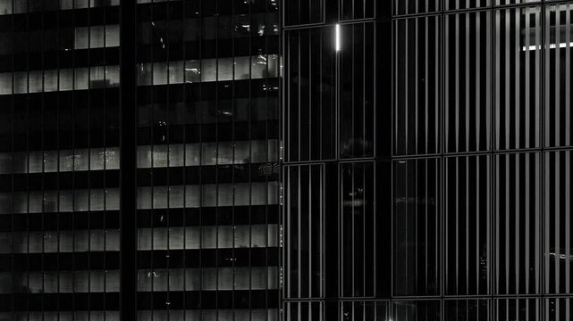 Night in Tokyo : Monochrome City Night with Lights in the Windows of Skyscrapers and Unmanned Elevators Going Up and Down  |  Shibuya, Tokyo, Japan