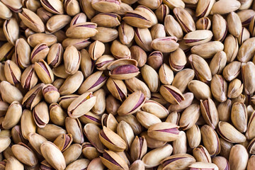 New harvest pistachio background. Close-up taken.This image can be used vertically or horizontally.	