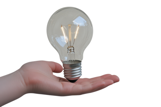 Holding an illuminated light bulb in a hand, symbolizing ideas, innovation, and creativity in a clear and isolated setting during the day - Powered by Adobe
