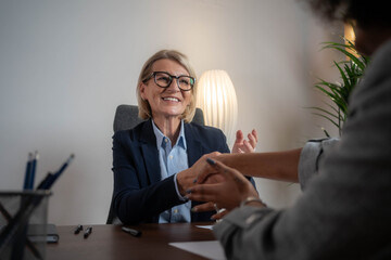 Businesswoman handshake with client, diverse woman in banking agreement and HR contract