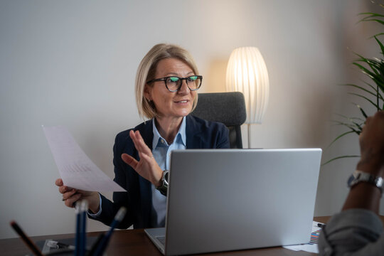 Woman consulting with a female financial manager at the bank.	