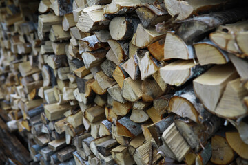 Stacked Firewood Logs in an Outdoor Pile for Natural Heat Sources and Rustic Decor