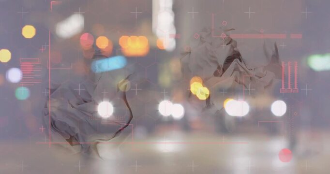 Animation of blurred night city street over crumbled paper