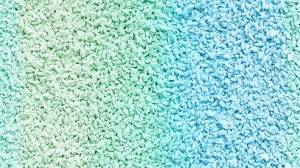Abstract Texture: An abstract shot of a textured surface, showcasing a gradient of colors. The image plays with depth and shadows, creating a visually engaging and modern aesthetic.