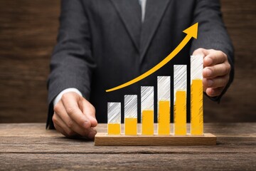 Businessman in suit presenting a growing gigapixel standard in an office setting during a business meeting focused on innovative technology