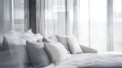 Serene morning view of simply styled hotel bedroom with soft pillows and natural light for hotel marketing, travel blogs, or relaxation concepts.