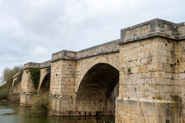 Fototapeta premium Historic Fitero Bridge over the Pisuerga River, Itero de la Vega