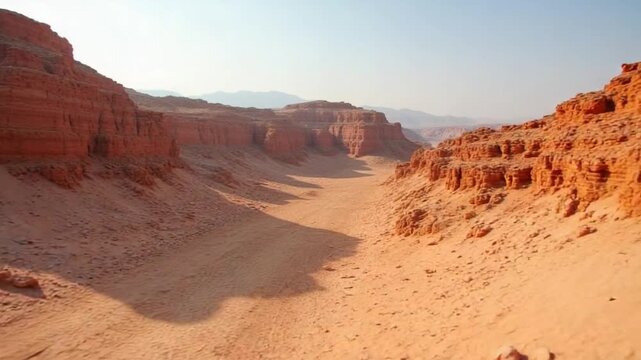An arid terrain showcases dry soil and rocky hills, illuminated