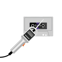 A gray cassette tape is pierced by a futuristic device, showcasing a contrast between vintage and modern technology.