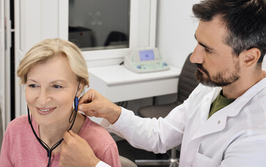 Audiologist customizes a hearing aid to improve an individual's audio experience with advanced techniques. Real ear measurements