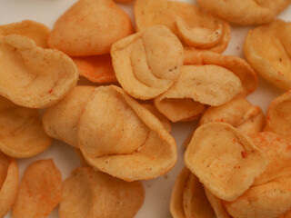 Piled of shrimp crackers on white background