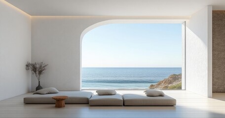 Minimalist room with low cushions, a small wooden table, and a vase with dried branches overlooking a calm ocean view through a large arched window