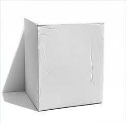 Naklejka premium Plain white rectangular box with visible creases casting a shadow on a white surface, suggesting minimalistic and neutral packaging