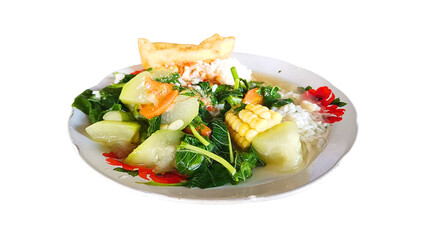 A healthy meal of warm steamed rice, fresh vegetable soup with clear broth, and tender tofu served...