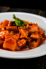 Chicken with pineapple in sweet and sour sauce. Asian food. Chinese cuisine